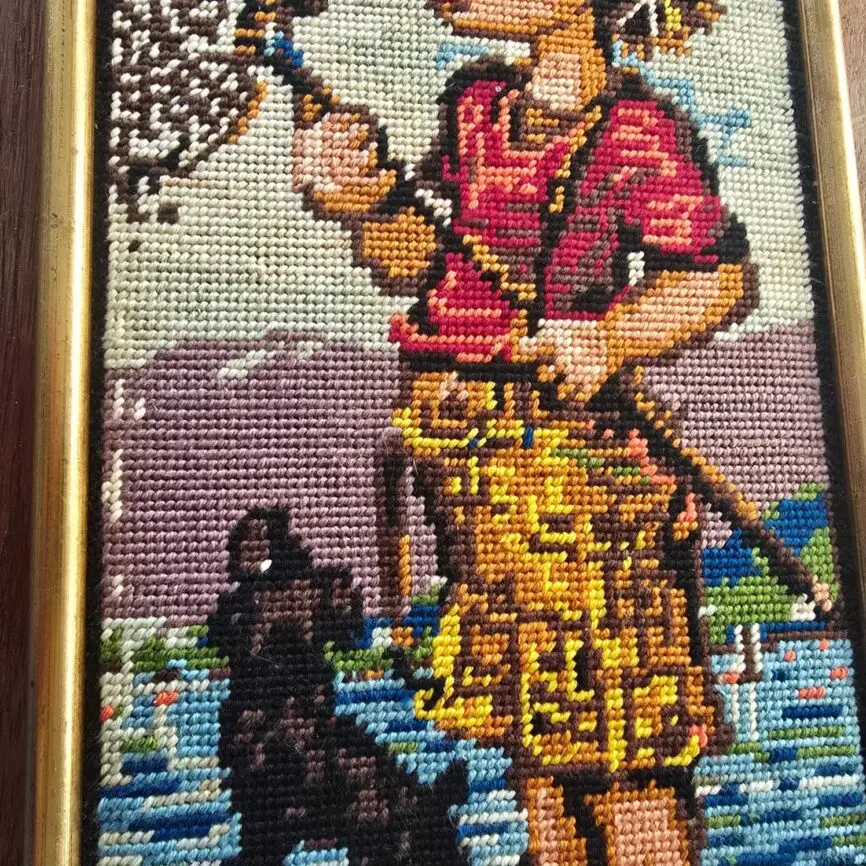 Détail de l'épuisette du petit garçon du canevas vintage création Paris Margot