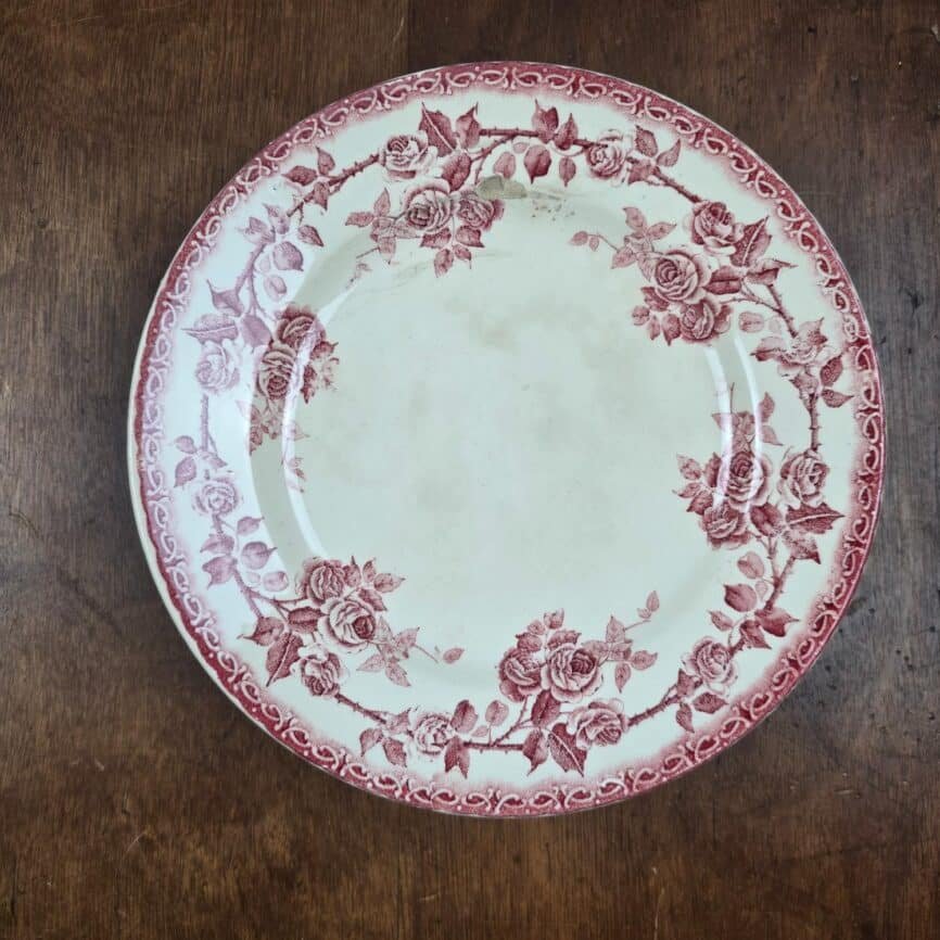 Compotier ancien HB & Cie roses rouges en terre de fer, plat sur pied patinée vue de dessus