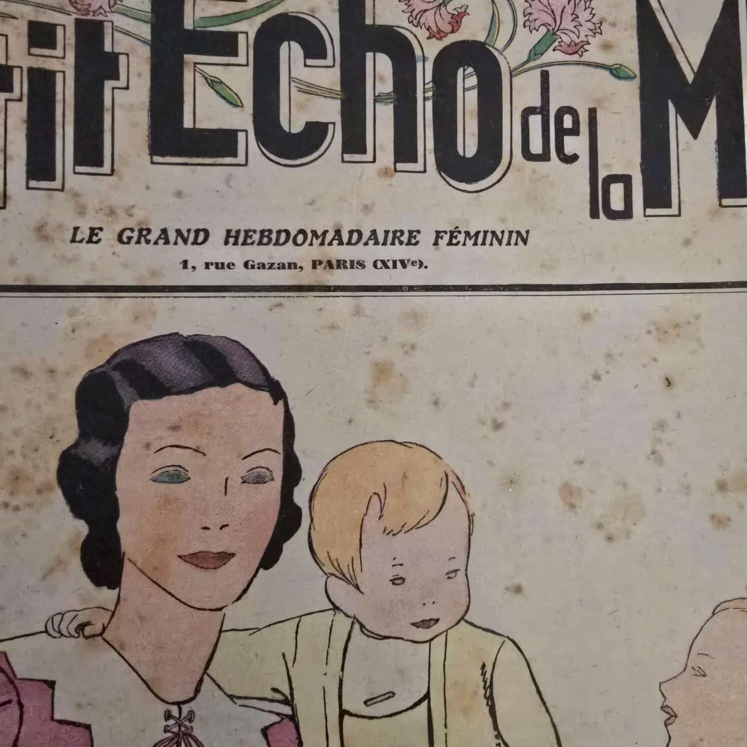 Le Petit Écho de la Mode de 1938, zoom sur le visage d'une femme de la couverture et son bébé
