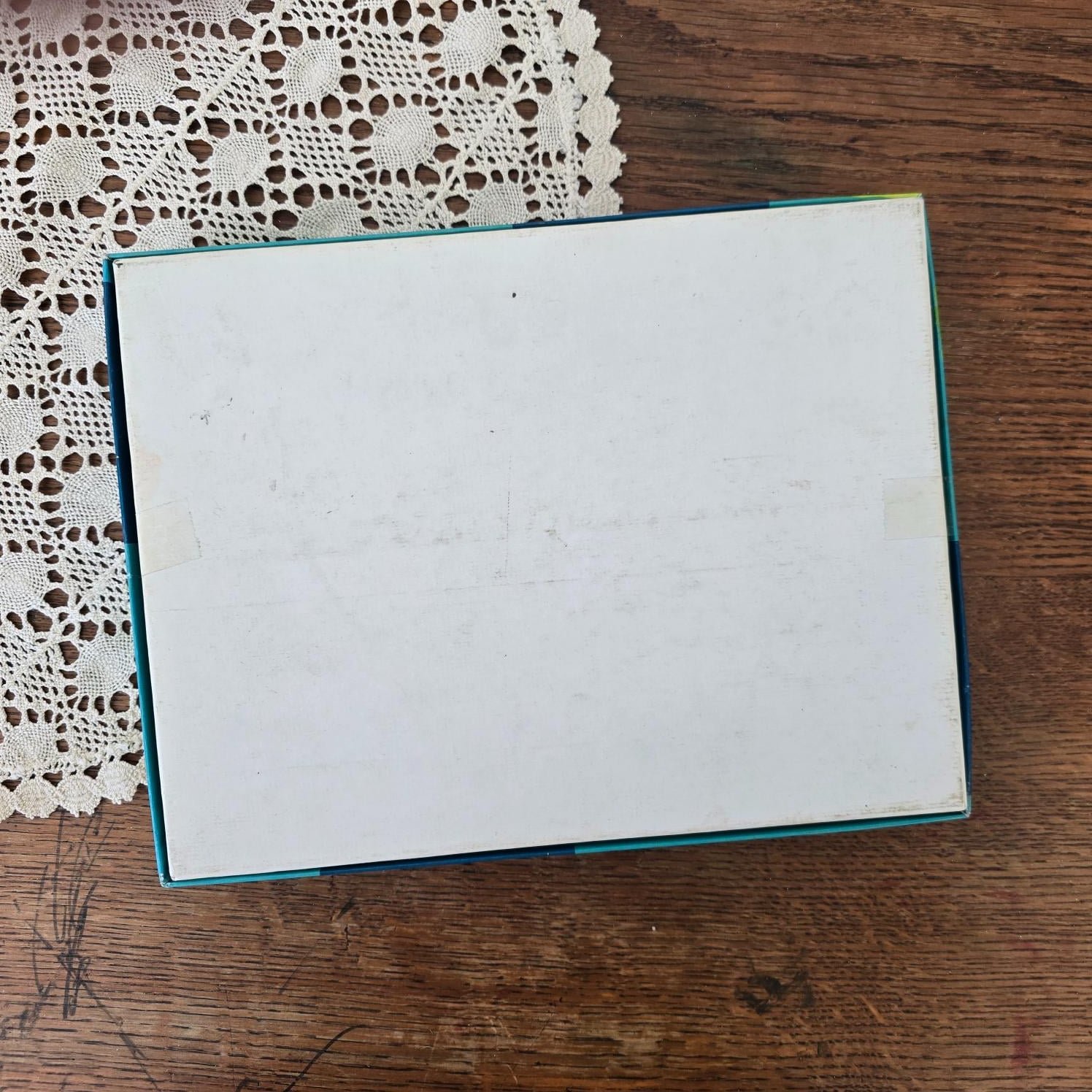 Dos blanc de la boîte du puzzle Au bord de la mer Fernand Nathan