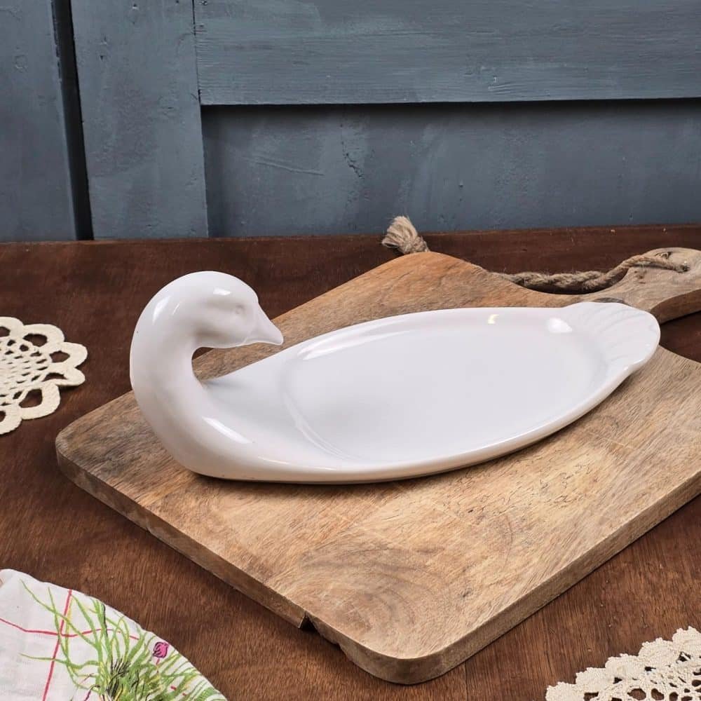 Plat à foie gras en porcelaine blanche Revol, forme canard.